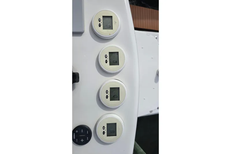 Hat Trick Yacht Photos Pics Control panel of a 2020 SeaVee 390Z boat with digital displays.