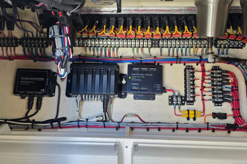 Hat Trick Yacht Photos Pics Electrical system of a 2020 SeaVee 390Z boat, showcasing wiring and components.