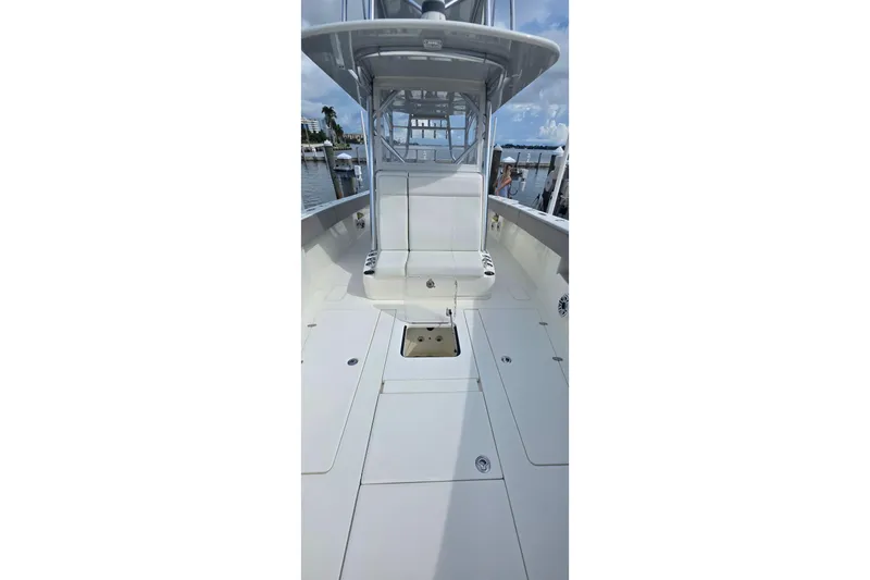 Hat Trick Yacht Photos Pics 2020 SeaVee 390Z boat interior with seating and storage compartments.