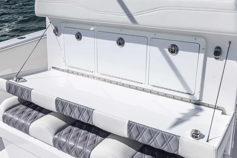  Yacht Photos Pics Luxury seating and storage on 2025 Invincible 35 Catamaran, featuring quilted upholstery.