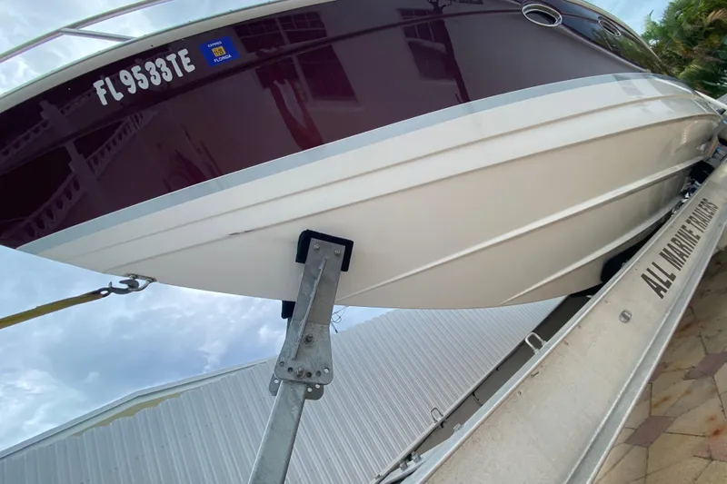  Yacht Photos Pics 2009 Formula 330 Sun Sport boat on trailer, Florida registration visible.