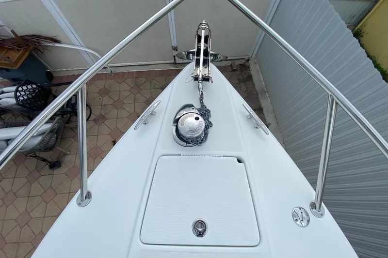  Yacht Photos Pics 2009 Formula 330 Sun Sport boat bow with anchor and stainless steel railings.