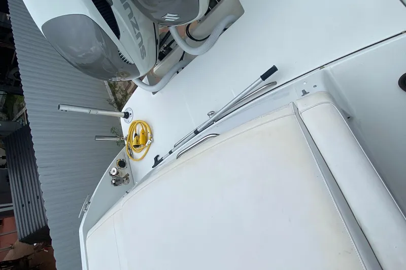 Yacht Photos Pics 2009 Formula 330 Sun Sport boat deck with Suzuki engine and accessories.