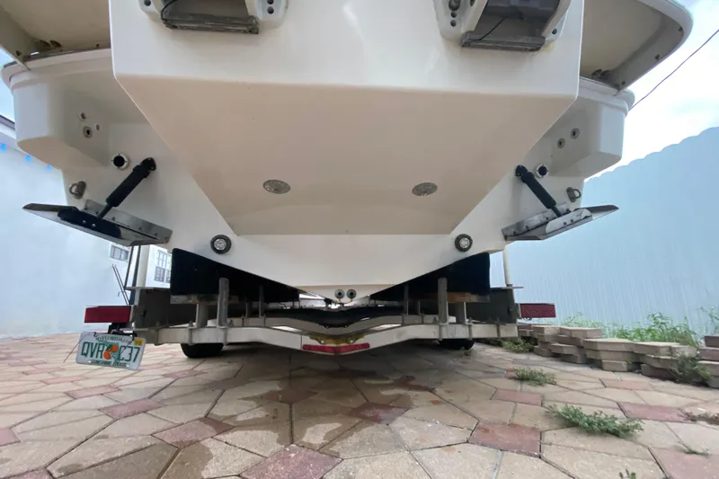  Yacht Photos Pics Rear view of a 2009 Formula 330 Sun Sport boat on a trailer.