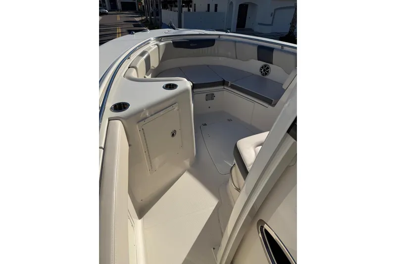  Yacht Photos Pics 2017 Robalo R302 Center Console boat interior with seating and storage compartments.