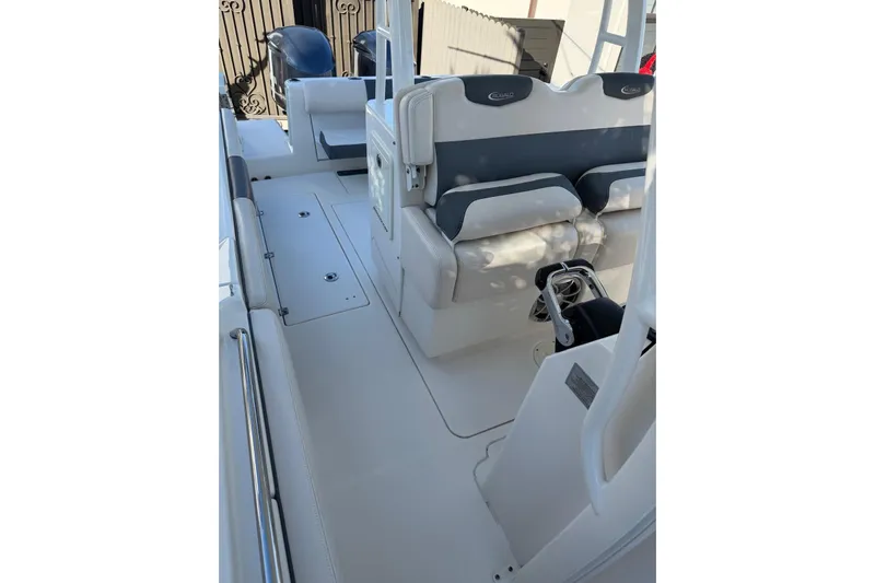  Yacht Photos Pics 2017 Robalo R302 Center Console boat interior with seating and storage compartments.