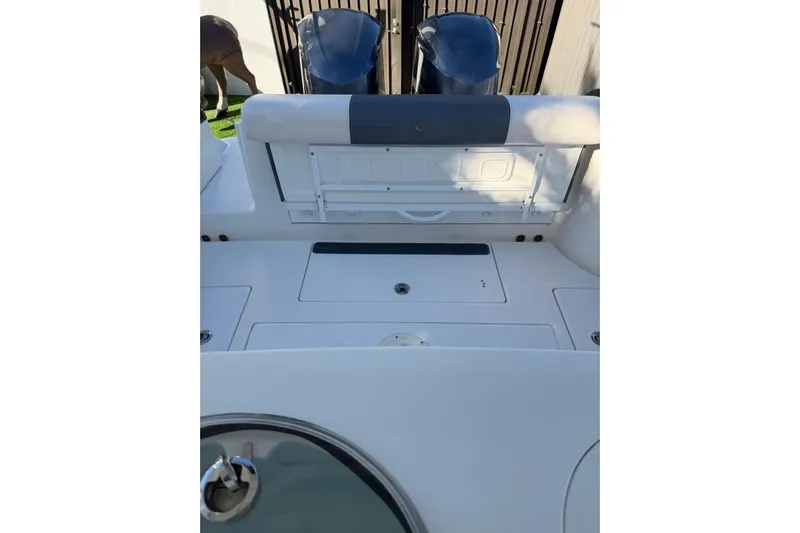  Yacht Photos Pics 2017 Robalo R302 Center Console boat interior with storage compartments.