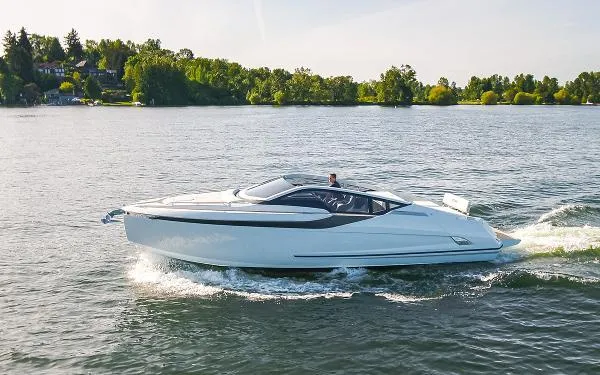 Just Us Yacht Photos Pics 2022 Fairline F//Line 33 yacht cruising on a serene lake with lush green surroundings.