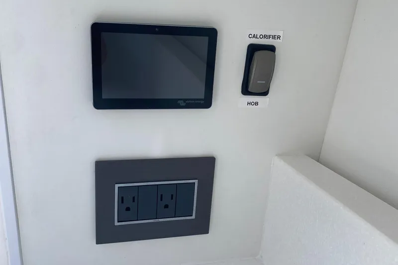 Just Us Yacht Photos Pics Control panel and outlets on 2022 Fairline F//Line 33 yacht interior.