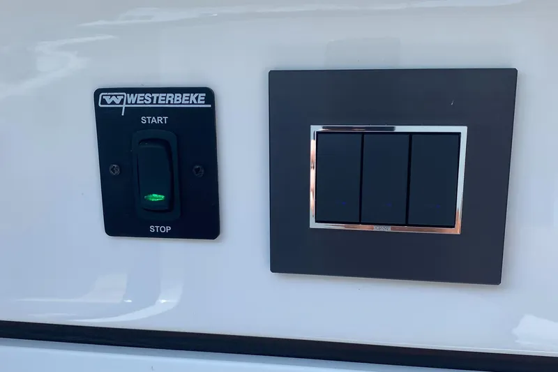 Just Us Yacht Photos Pics Control panel on 2022 Fairline F//Line 33 yacht with Westerbeke start-stop switch.