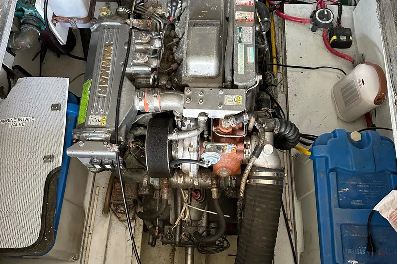  Yacht Photos Pics Engine compartment of a 2001 Mast & Mallet 38 Picnic Boat, featuring a Yanmar engine.