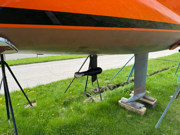 Yacht Photos Pics 2025 Saffier 24 Lite sailboat hull and keel on grass with supports.