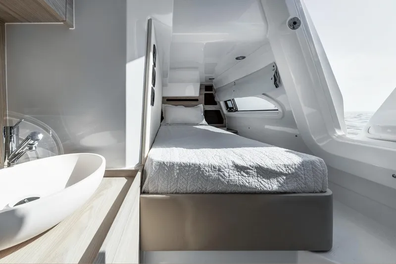 Azimut 53 Fly Yacht Photos Pics Luxurious cabin interior of 2026 Azimut Fly 53 yacht with modern design and comfortable bed.