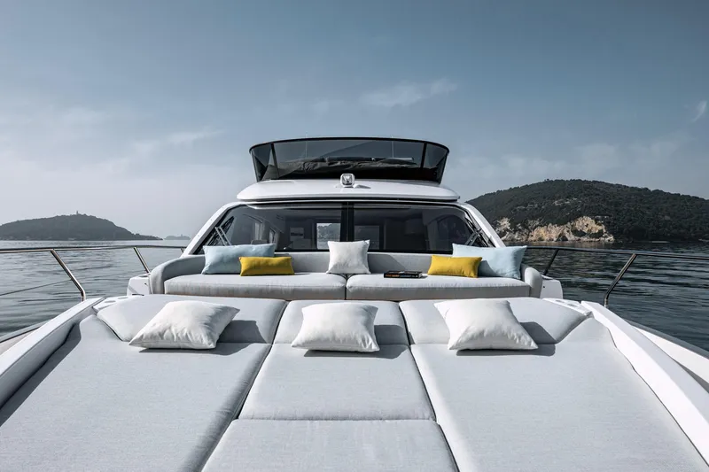 Azimut 53 Fly Yacht Photos Pics 2026 Azimut Fly 53 yacht with luxurious sunbathing area and scenic ocean view.