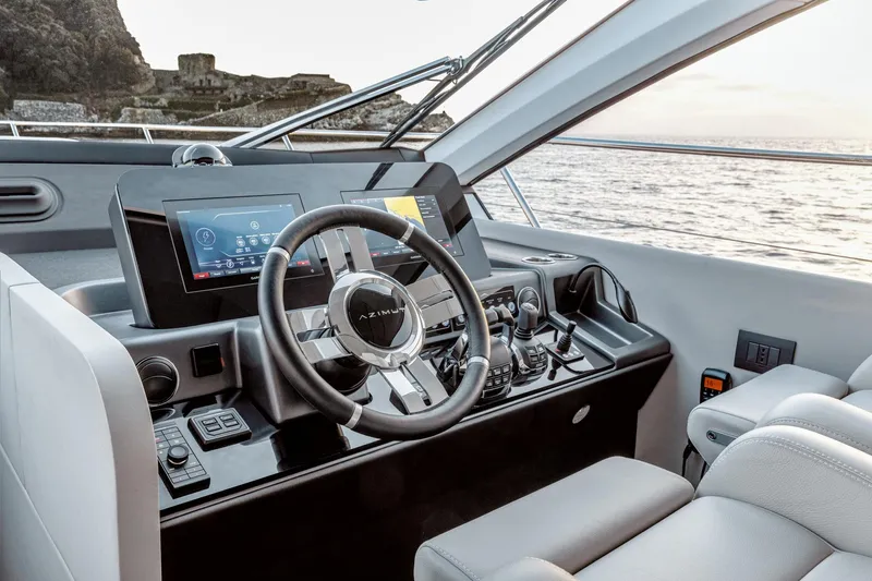 Azimut 53 Fly Yacht Photos Pics Helm of 2026 Azimut Fly 53 yacht with modern controls and ocean view.