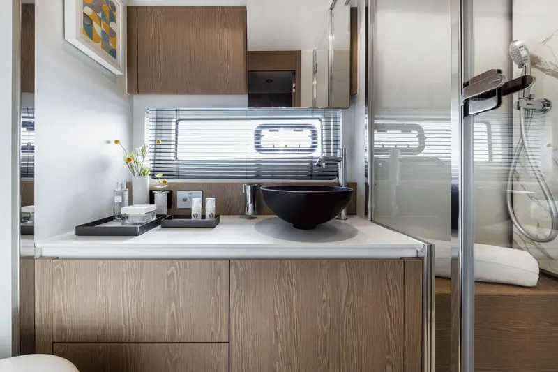 Azimut 53 Fly Yacht Photos Pics Luxurious bathroom interior of 2026 Azimut Fly 53 yacht with modern fixtures and elegant design.