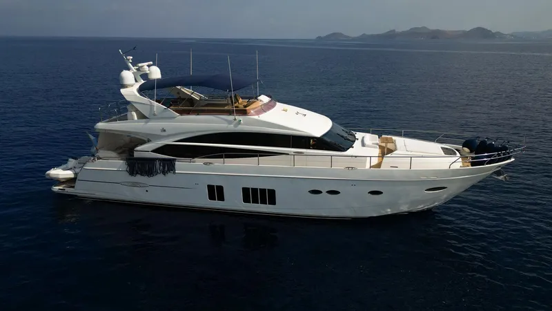  Yacht Photos Pics Luxury 2012 Princess 72 yacht cruising on calm ocean waters.