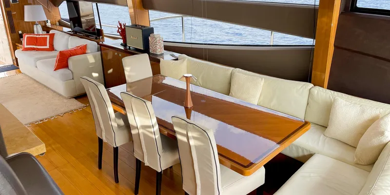  Yacht Photos Pics Luxurious interior of 2012 Princess 72 yacht with elegant dining area and comfortable seating.