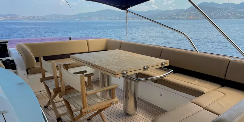  Yacht Photos Pics Luxurious seating area on a 2012 Princess 72 yacht with ocean view.