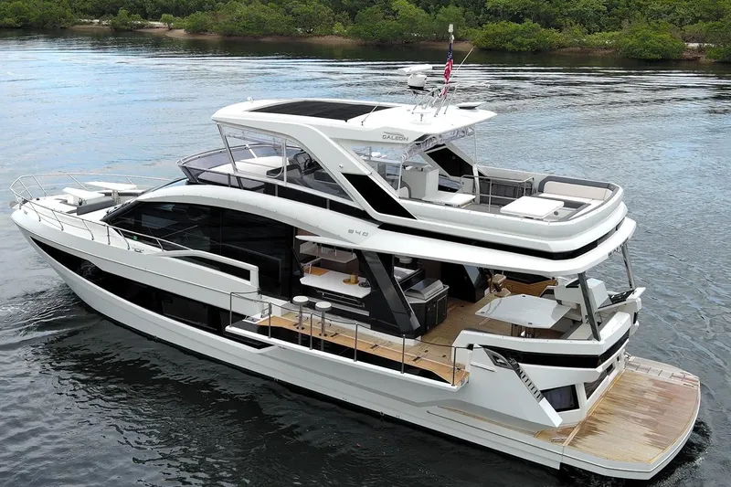  Yacht Photos Pics 2025 Galeon 640 Fly luxury yacht cruising on serene waters.