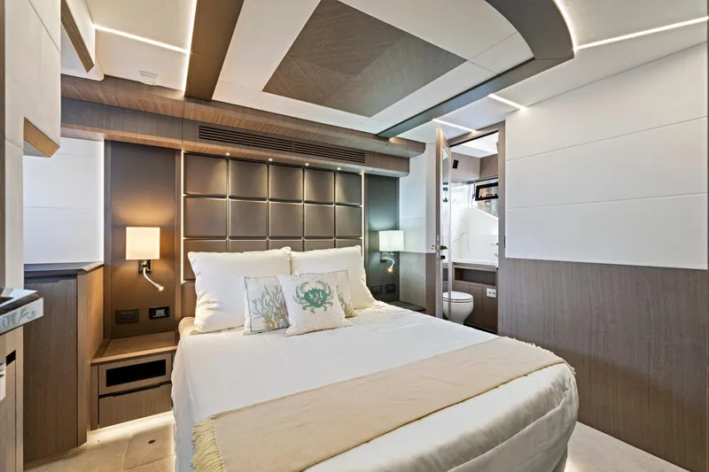  Yacht Photos Pics Luxurious bedroom interior of 2025 Galeon 640 Fly yacht, featuring modern design and elegant lighting.