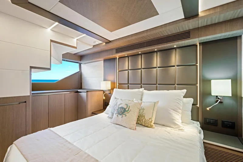  Yacht Photos Pics Luxurious bedroom interior of 2025 Galeon 640 Fly yacht with modern design.