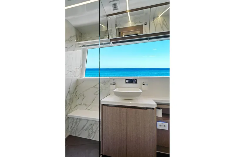  Yacht Photos Pics Luxurious bathroom on 2025 Galeon 640 Fly yacht with ocean view and modern design.