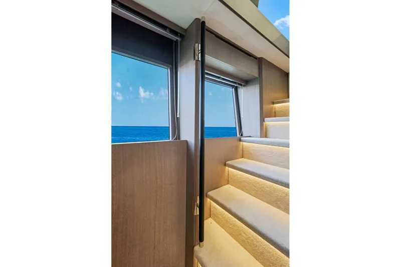  Yacht Photos Pics Interior staircase of 2025 Galeon 640 Fly yacht with ocean view.