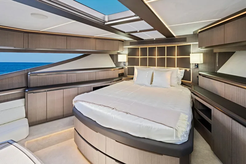  Yacht Photos Pics Luxurious bedroom interior of 2025 Galeon 640 Fly yacht with modern design and ocean view.