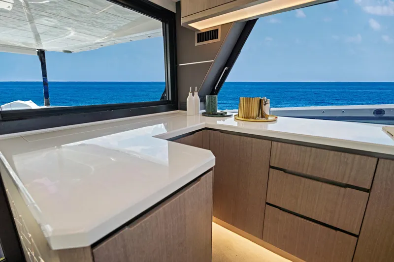 Yacht Photos Pics Luxurious kitchen interior of 2025 Galeon 640 Fly yacht with ocean view.