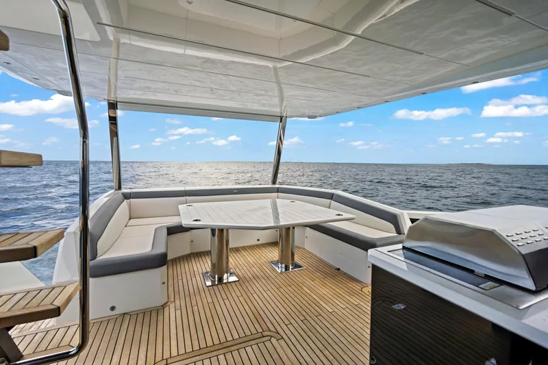  Yacht Photos Pics Luxurious 2025 Galeon 640 Fly yacht deck with seating and ocean view.