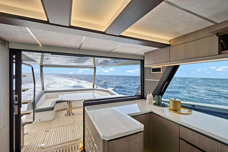  Yacht Photos Pics Luxurious interior of 2025 Galeon 640 Fly yacht with ocean view and modern design.