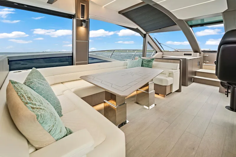  Yacht Photos Pics Luxurious interior of 2025 Galeon 640 Fly yacht with elegant seating and ocean view.