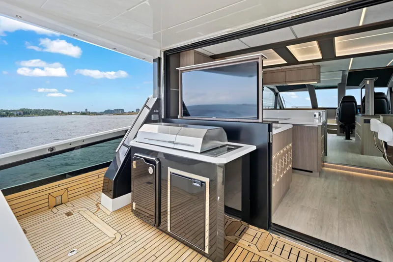  Yacht Photos Pics 2025 Galeon 640 Fly yacht interior with modern kitchen and scenic ocean view.