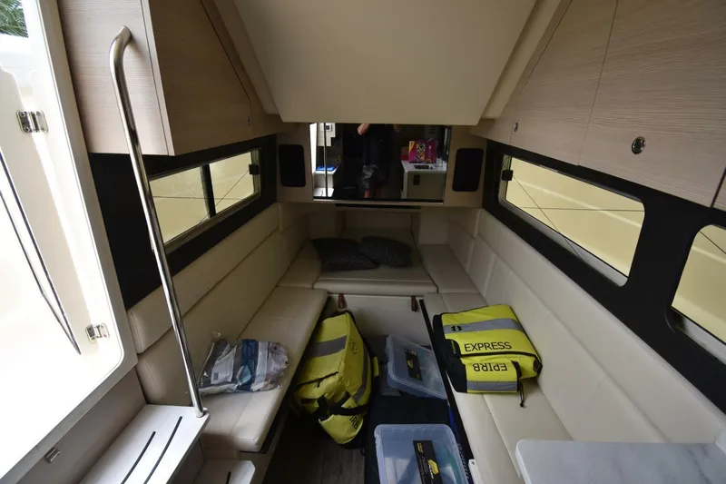  Yacht Photos Pics Interior cabin of 2022 Scout 425 LXF boat with seating and storage.