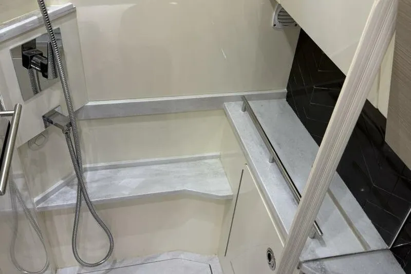  Yacht Photos Pics 2022 Scout 425 LXF interior shower with modern fixtures and sleek design.