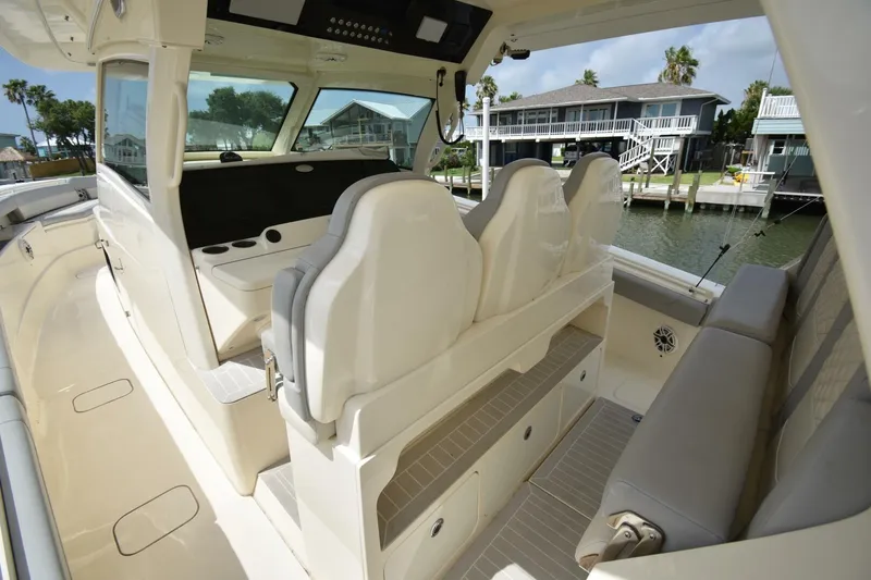  Yacht Photos Pics 2022 Scout 425 LXF boat interior with luxurious seating and modern design.