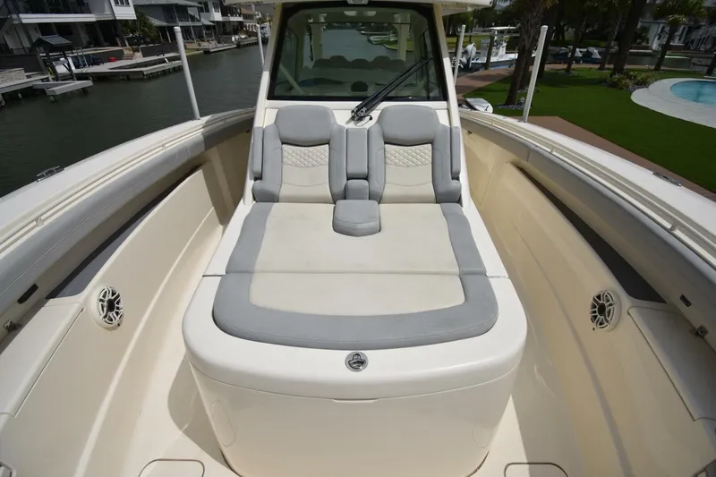  Yacht Photos Pics 2022 Scout 425 LXF boat with luxurious seating and sleek design.