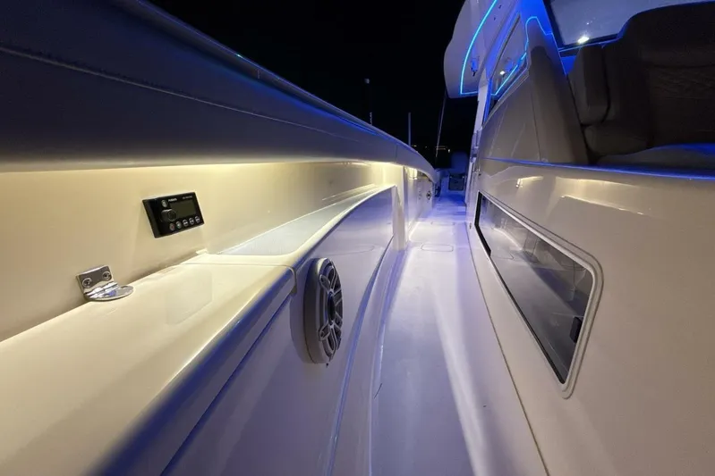  Yacht Photos Pics 2022 Scout 425 LXF boat interior with ambient lighting and sleek design.