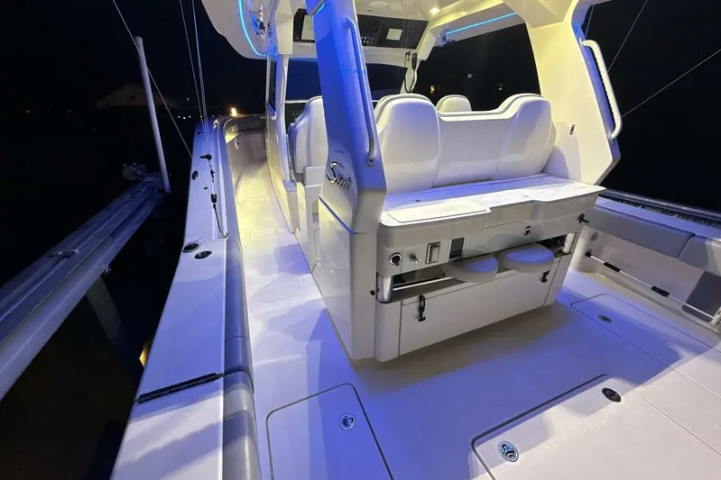  Yacht Photos Pics 2022 Scout 425 LXF boat interior with illuminated seating and modern design.