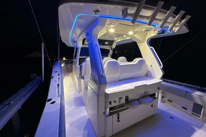  Yacht Photos Pics 2022 Scout 425 LXF boat interior with illuminated seating and modern design.