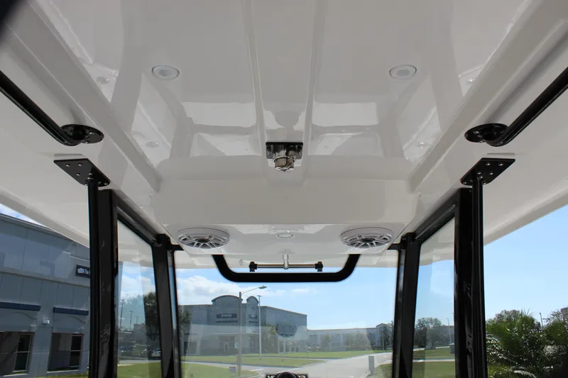  Yacht Photos Pics 2024 Fountain 32 NX boat interior roof with speakers and lighting.