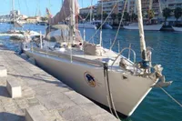 Sailboat docked in a marina, Cape Codder Coder Withbread 57, 1985 model.