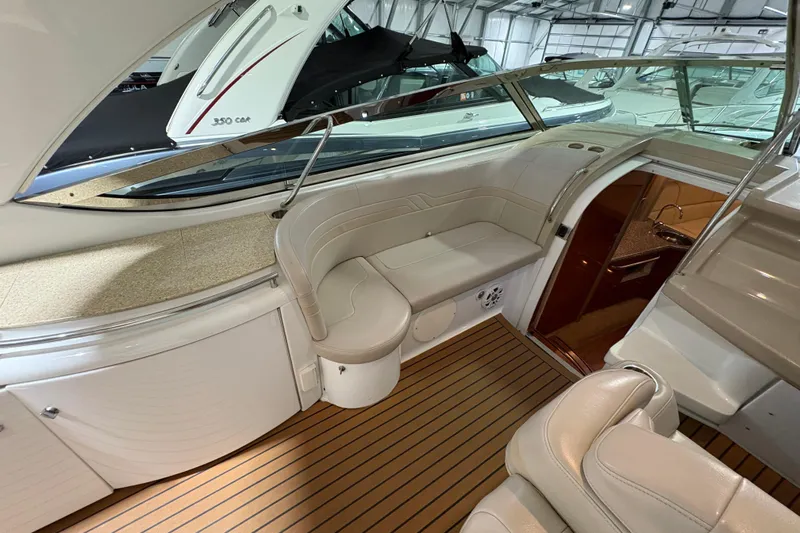  Yacht Photos Pics 2008 Formula 400 Super Sport yacht interior with beige seating and wood flooring.