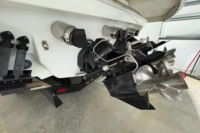  Yacht Photos Pics 2008 Formula 400 Super Sport boat stern with dual propellers in a garage setting.