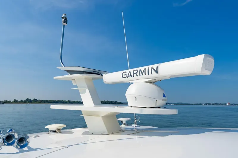 Bacchus Yacht Photos Pics 2022 Tiara Yachts Coupe with Garmin radar on calm water.