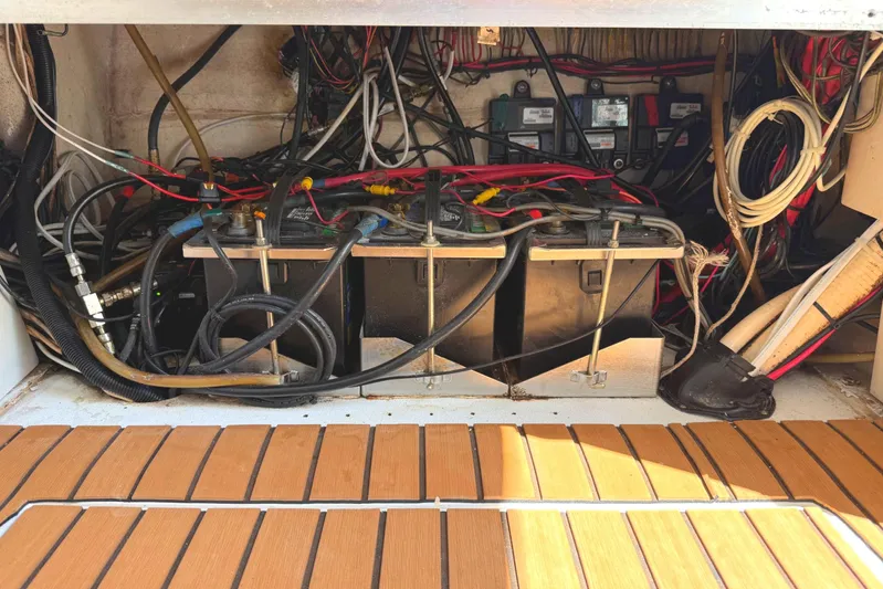 Huntress Yacht Photos Pics Electrical wiring and batteries in a 2007 SeaHunter 40 boat compartment.