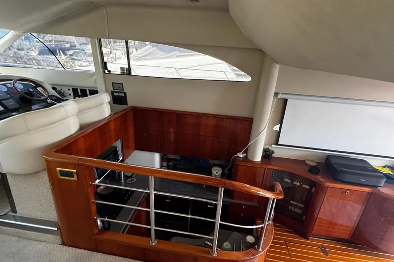 My Way Yacht Photos Pics Interior of 2001 Fairline 55 yacht with wood finishes and modern amenities.