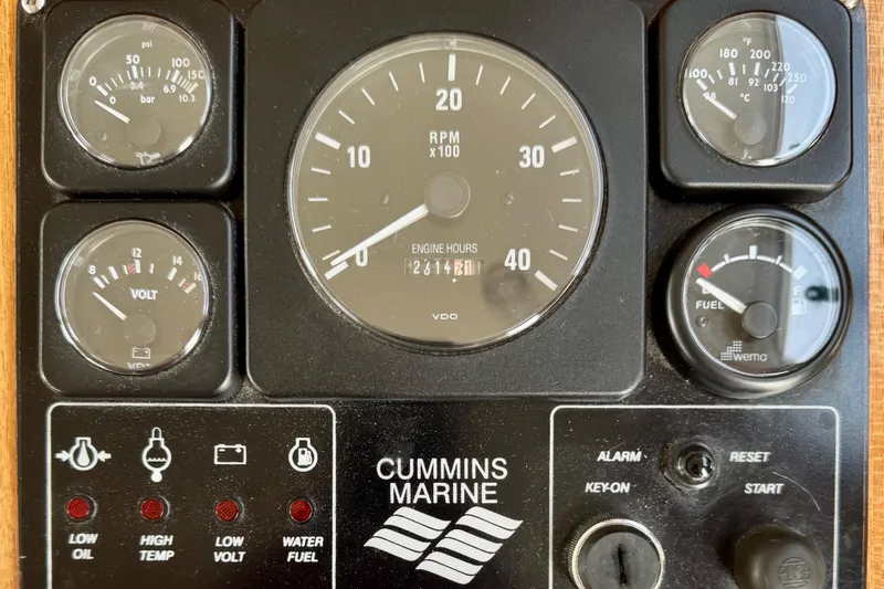 Rosie Mclane Yacht Photos Pics Instrument panel of a Cummins Marine engine with various gauges and indicators.
