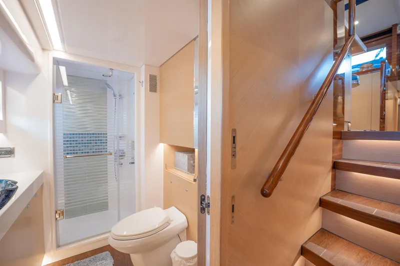 Passion Yacht Photos Pics Luxurious bathroom and staircase in 2019 Horizon PC52 yacht interior.